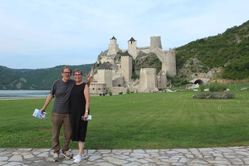 Couple of people in front of the Golubac fortress.